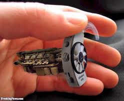 Radical fantasy hearing aid with a mechanical cooling fan built in.